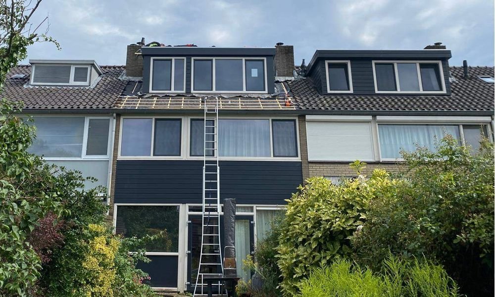 Wat kost een plat dak herstellen in Elsloo?